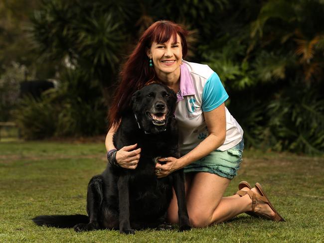 Stacey Robertson-Falvey with labrador cross Morris, who has lost weight with his new diet. Picture: Zak Simmonds