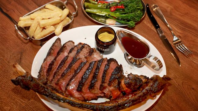 The Tomahawk steak with sides at the Chophouse in Parramatta.