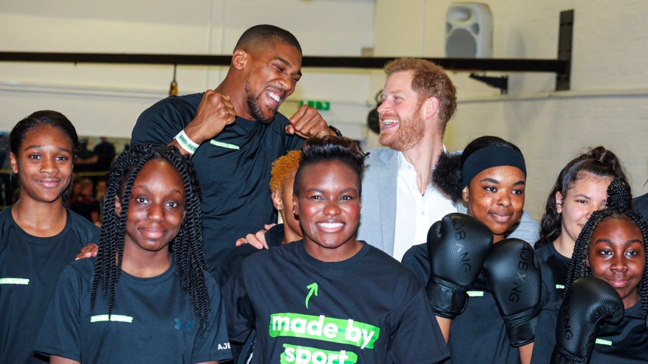 Prince Harry in the ring with former heavyweight world champion