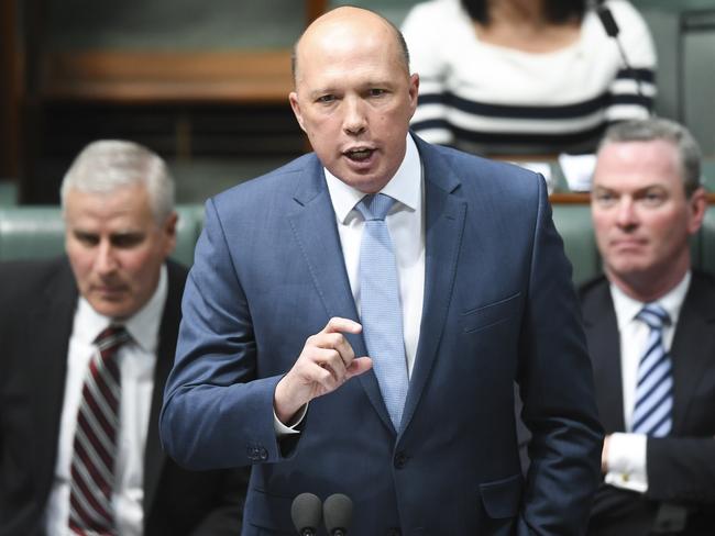 Australian Minister for Home Affairs Peter Dutton speaks during House of Representatives Question Time at Parliament House in Canberra, Wednesday, May 23, 2018. (AAP Image/Lukas Coch) NO ARCHIVING
