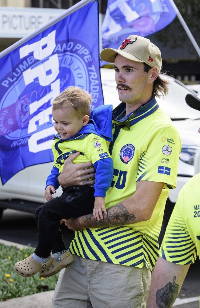 Zak Patterson and son Hudson march with the PPTEU in the Toowoomba Labour Day March, Saturday, May 3, 2025. Picture: Kevin Farmer