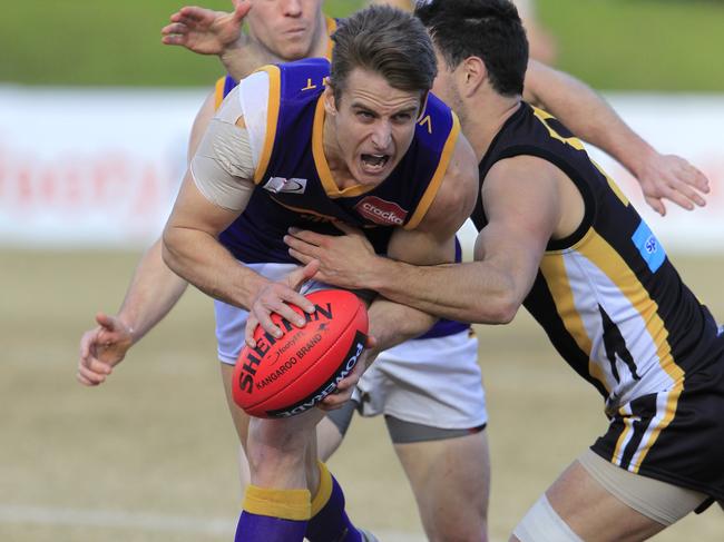 Ryan Mullett will again pull on the purple and gold in 2019. Picture: Richard Serong 