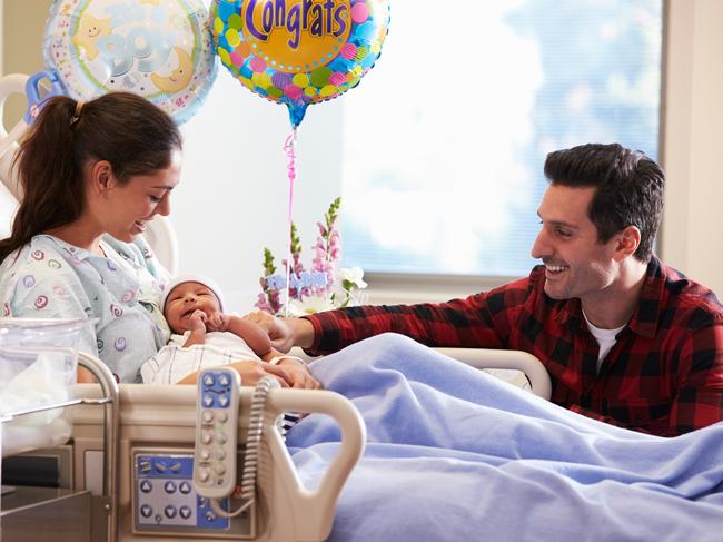 Generic photo to illustrate health insurance  ..  young family pictured in a hospital room.   Picture: iStock