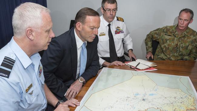 The Prime Minister, Tony Abbott received a briefing on Iraq from the Chief of the Defence Force, Air Chief Marshal Mark Binskin; Vice Chief of the Defence Force, Vice Admiral Ray Griggs; Chief of Joint Operations, Vice Admiral David Johnston; and senior ADF members. Picture: Lauren Larking