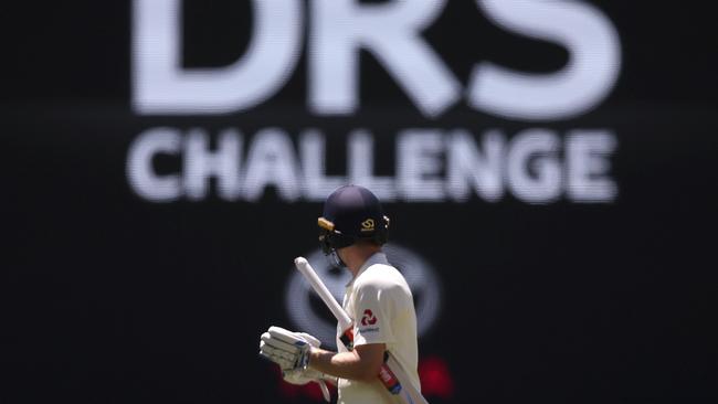 England's Chris Woakes looks on after his review challenge was dismissed. Picture: AP.