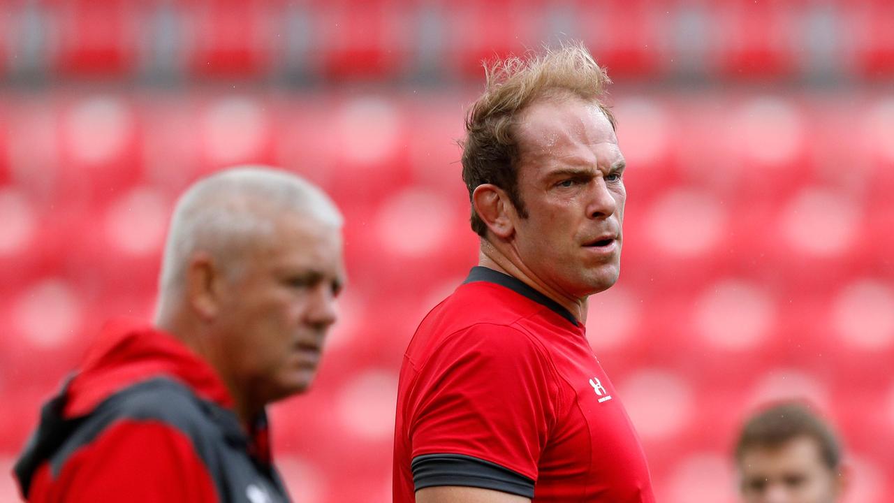 Wales' lock Alun Wyn Jones (C) and Wales' head coach Warren Gatland (L) look on during the captain's run at Toyota Stadium in Toyota City on September 22, 2019, during the Japan 2019 Rugby World Cup. (Photo by Adrian DENNIS / AFP)