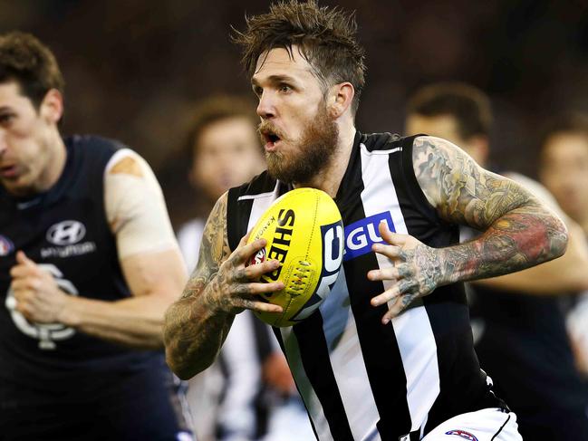 Dane Swan runs forward during the 2nd quarter of the Carlton v Collingwood match at the MCG. Friday July 5, 2013.