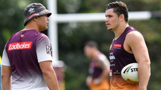 Anthony Seibold chats with James Roberts during a Broncos training session. Picture: AAP