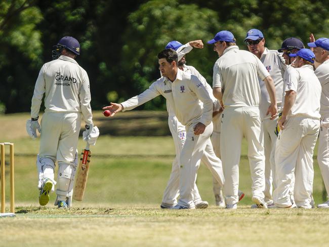 Tom Boxell puts the ball beside the stumps after taking a wicket for Long Island. Picture: Valeriu Campan