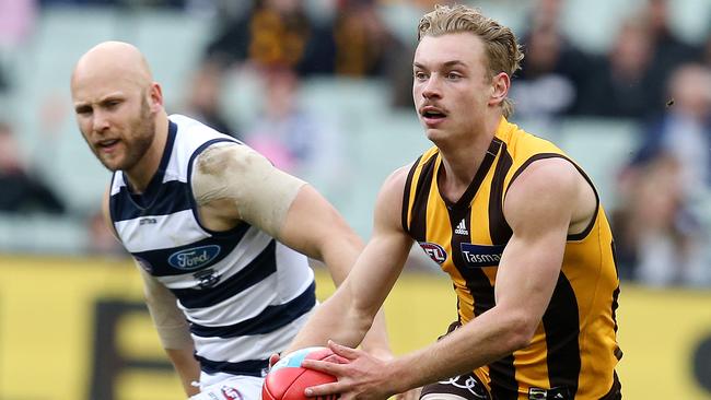 James Worpel skips away from Gary Ablett. Picture: Michael Klein