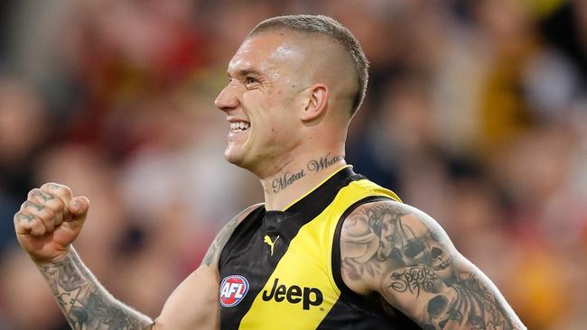 Dustin Martin celebrates one of his six goals against Brisbane Lions.