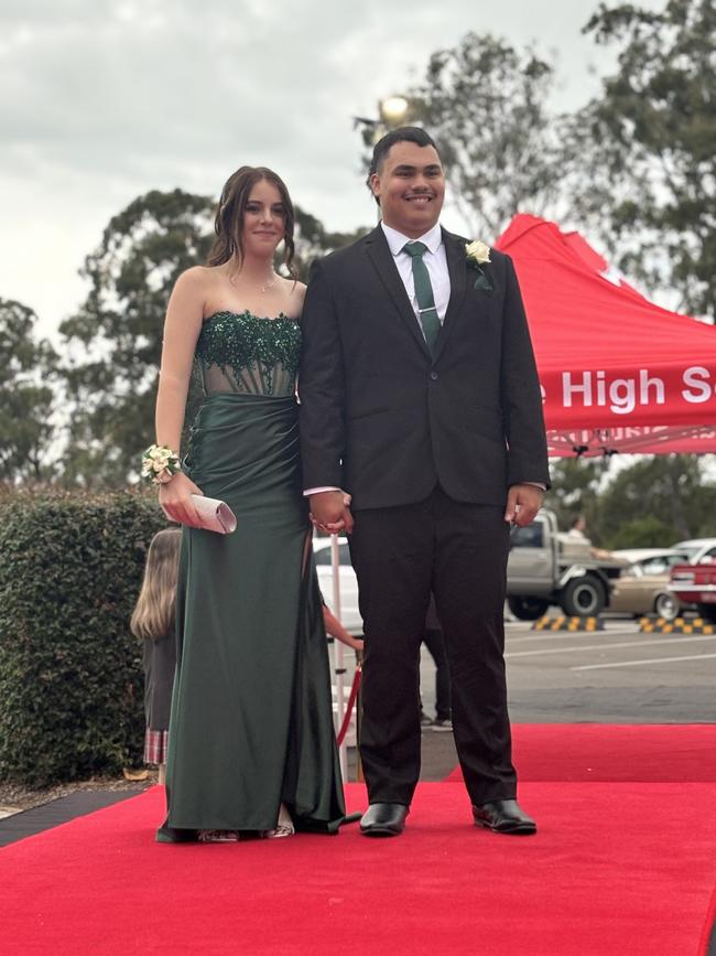 Students from Urangan State High School arrive at their formal.