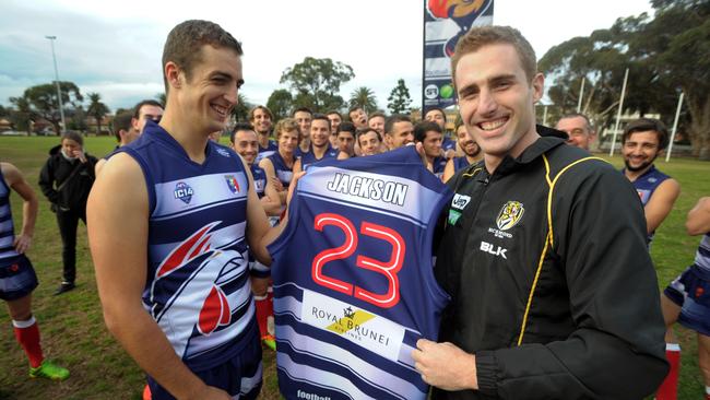 French AFL team Les Coqs captain Gregoire Patacq with Richmond player Daniel Jackson at St Kilda for the international championships in 2014. Picture: Andrew Henshaw