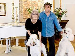 FOR SALE: Former Delltones singer Brian Perkins and wife, Janis, at their rainforest retreat home being auctioned on June 26.