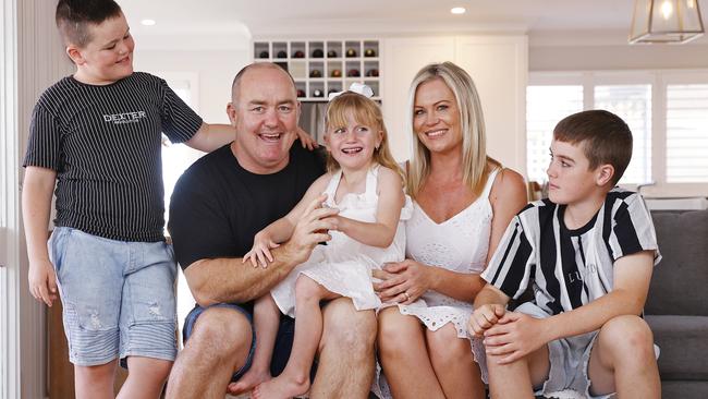 Mark and Karli Riddell pictured with their daughter Ava, 6, and sons Will (left) and Harry (right) at Shellharbour today. Ava suffers from the rare condition know as Ogden Syndrome. Picture: Sam Ruttyn