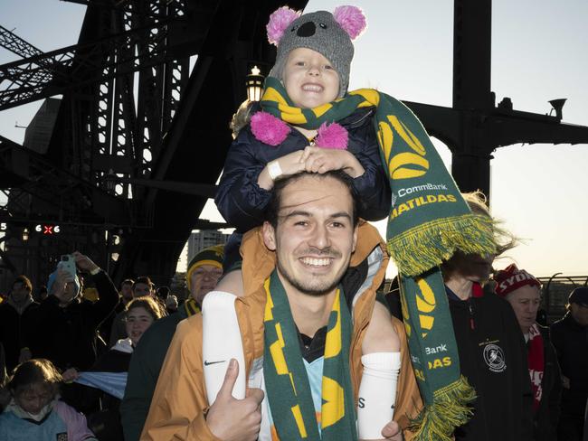 SYDNEY, AUSTRALIA, Daily Telegraph, Sunday, 25 June 2023.Lexi Mallam 5 and Oscar Killick-Dodd pictured on Sydney Harbour Bridge, closed and transformed into a festival of football to celebrate 25 days to go until the official kick-off of FIFA Women's World Cup Australia & New Zealand 2023.Picture: Daily Telegraph, Monique Harmer