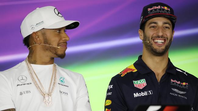 The 2017 Australian Formula 1 Grand Prix at Albert Park. Press Conference with Fernando Alonso, Lewis Hamilton, Daniel Ricciardo and Sebastian Vettel. Lewis Hamilton removes a broken chair. Picture: Alex Coppel.