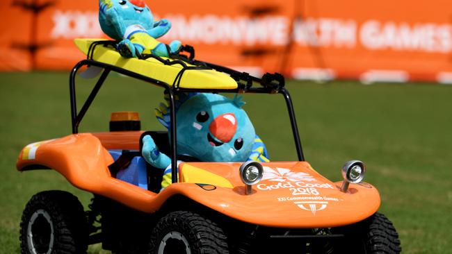 Mascot Borobi drives a beach buggy to collect the discus during day eight of competition of the XXI Commonwealth Games (AAP Image/Dean Lewins)