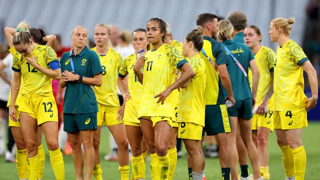 MARSEILLE, FRANCE - JULY 25: Players from Team Australia show dejection after the Women's group B match between Germany v Australia during the Olympic Games Paris 2024 at Stade de Marseille on July 25, 2024 in Marseille, France. (Photo by Alex Livesey/Getty Images)