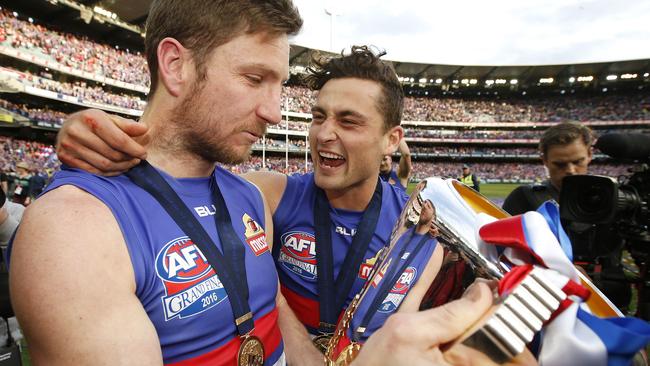 Matthew Boyd savours a moment with the premiership cup on the MCG. Picture: David Caird