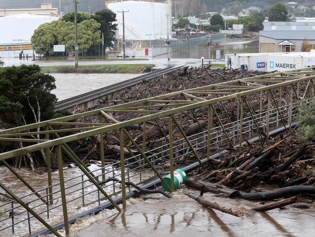 The Emu River flooded at Wivenhoe, causing damage and a log jam on the rail bridge. Picture: CHRIS KIDD