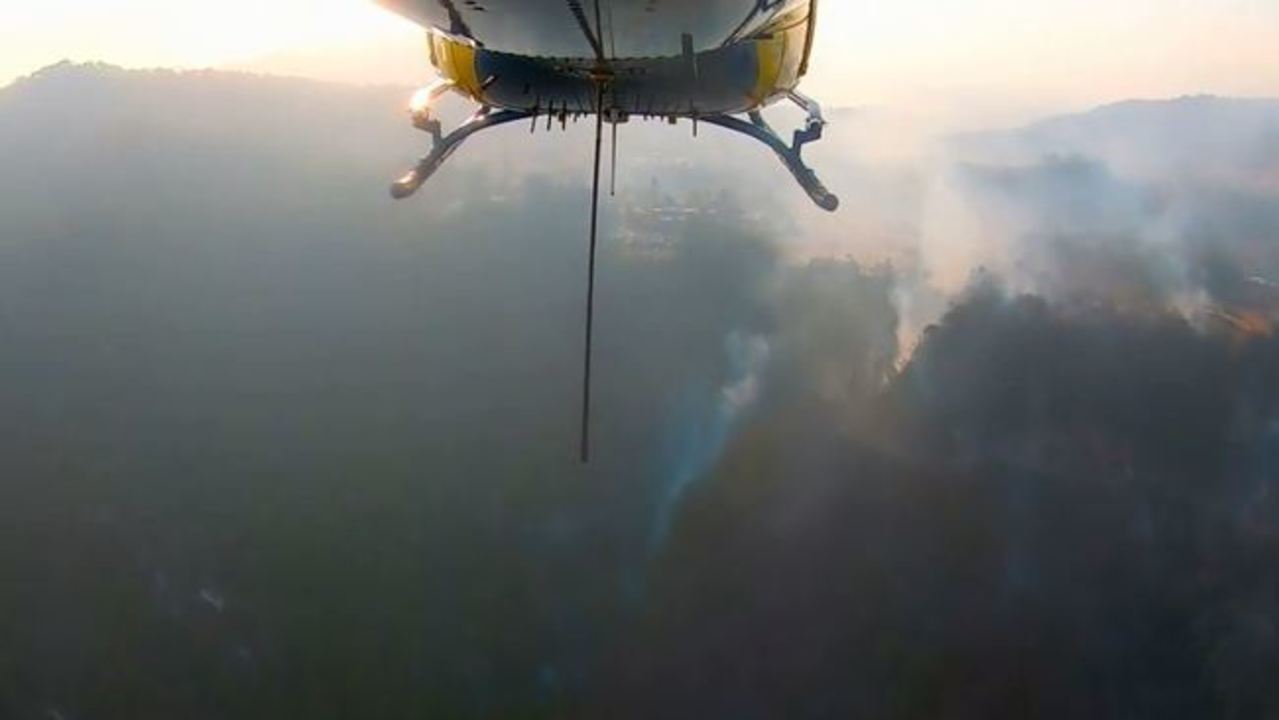 Rescue Helicopter Flies Over Eungella Bushfires and Evacuates Residents