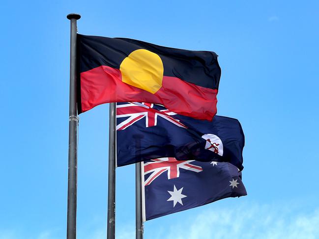The Aboriginal, Tasmanian and Australian flags flying above the Supreme Court in Hobart. Picture: SAM ROSEWARNE