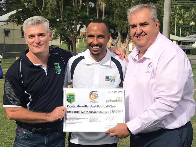 Murwillumbah president Darren McKay (left) and Football Gold Coast general manager Damien Bresic (right) with former Socceroo Archie Thompson last year.