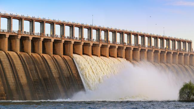 The Hume Dam wall in full flow near Albury Wodonga. Picture: Simon Dallinger