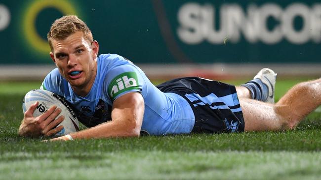 Tom Trbojevic scores a try for the Blues.