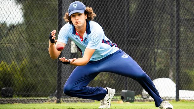 The bushy-haired teenager is also handy in the field. Photo: Tom Parrish