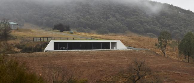 The house is invisible when approached from the main road.