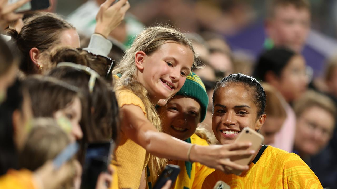 Mary Fowler of the Matildas poses for selfies with fans after the AFC Women's Asian Olympic Qualifier match between Australia and Chinese Taipei at HBF Park in Perth, Australia. (Photo by Will Russell/Getty Images)