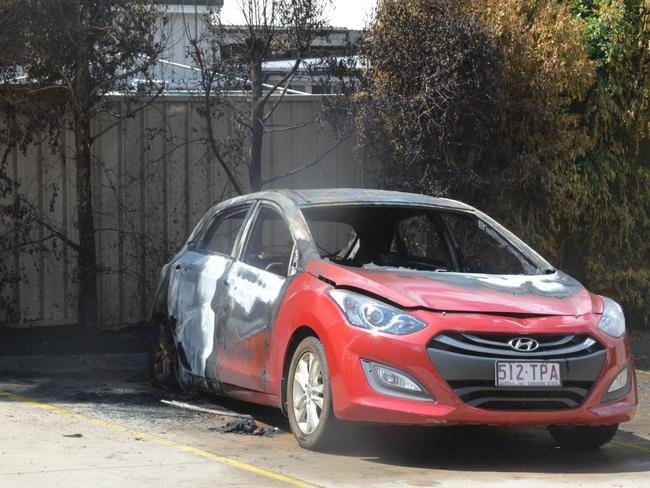 Suspected stolen vehicle found torched in business carpark