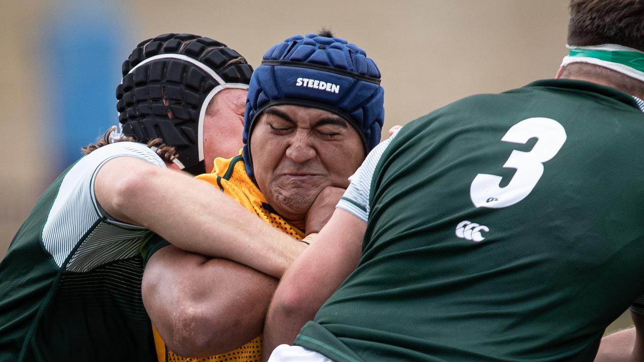 Moses Manu tackled by Barbarians Billy Mougios. Picture: Julian Andrews