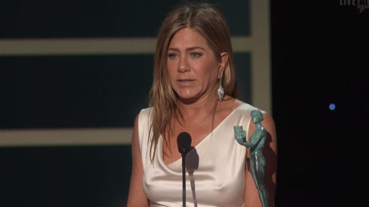 Aniston stunned in a white figure-hugging gown. Picture: Foxtel.