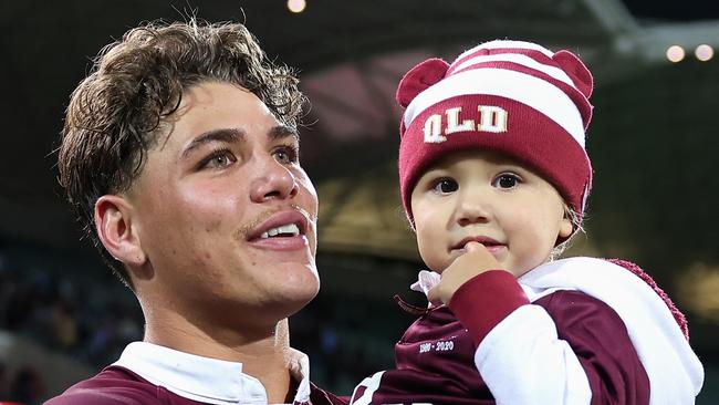 ADELAIDE, AUSTRALIA - MAY 31: Reece Walsh of the Maroons walks onto the field with his daughter after winning game one of the 2023 State of Origin series between the Queensland Maroons and New South Wales Blues at Adelaide Oval on May 31, 2023 in Adelaide, Australia. (Photo by Cameron Spencer/Getty Images)