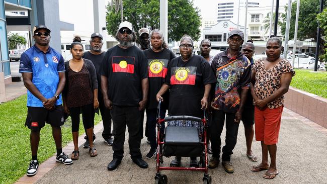 Family of Mr George comfort Gwenette George (centre) outside the Cairns Coroner's Court on the first day of the coronial inquest into his death in police custody in November 2022. Mr George's first name cannot be used for cultural reasons. Picture: Brendan Radke