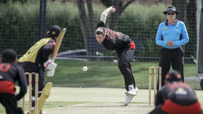 Premier: Tom O'Donnell bowling for Essendon. Picture: Valeriu Campan