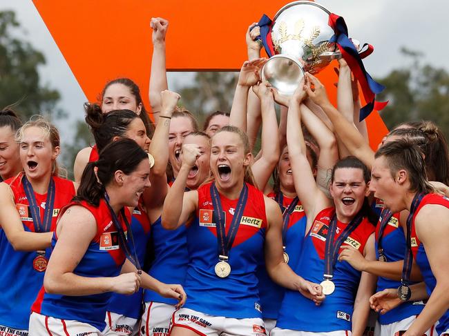 IPSWICH, AUSTRALIA - NOVEMBER 27: The Demons celebrate with the premiership cup during the 2022 AFLW Season 7 Grand Final match between the Brisbane Lions and the Melbourne Demons at Brighton Homes Arena, Springfield, Ipswich on November 27, 2022 in Ipswich, Australia. (Photo by Dylan Burns/AFL Photos via Getty Images)