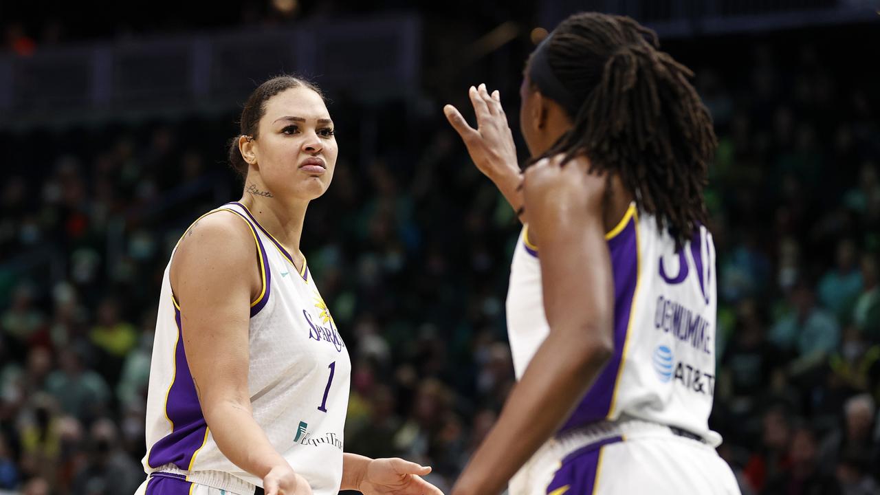 SEATTLE, WASHINGTON - MAY 20: Liz Cambage #1 and Nneka Ogwumike #30 of the Los Angeles Sparks react against the Seattle Storm during the second half at Climate Pledge Arena on May 20, 2022 in Seattle, Washington. NOTE TO USER: User expressly acknowledges and agrees that, by downloading and or using this photograph, User is consenting to the terms and conditions of the Getty Images License Agreement. Steph Chambers/Getty Images/AFP == FOR NEWSPAPERS, INTERNET, TELCOS &amp; TELEVISION USE ONLY ==