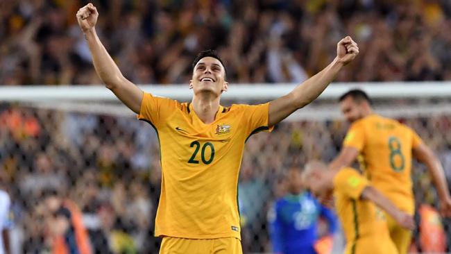 Trent Sainsbury celebrates after Australia defeated Honduras to qualify for Russia 2018.