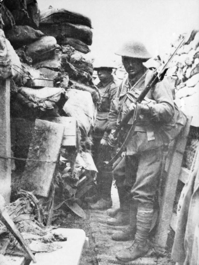 Soldiers of the 53rd Battalion in a trench in their frontline a few minutes before the launching of the attack in the battle of Fromelles during World War I in France.