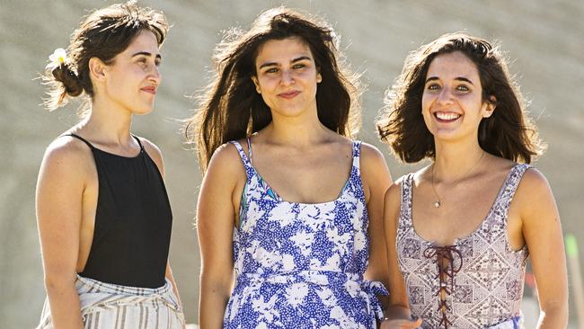 Lea Fernandez, Brooke Malouf  and Kaila D'Agostino discuss attitudes to what defines success at Bronte Beach. Picture: Jenny Evans