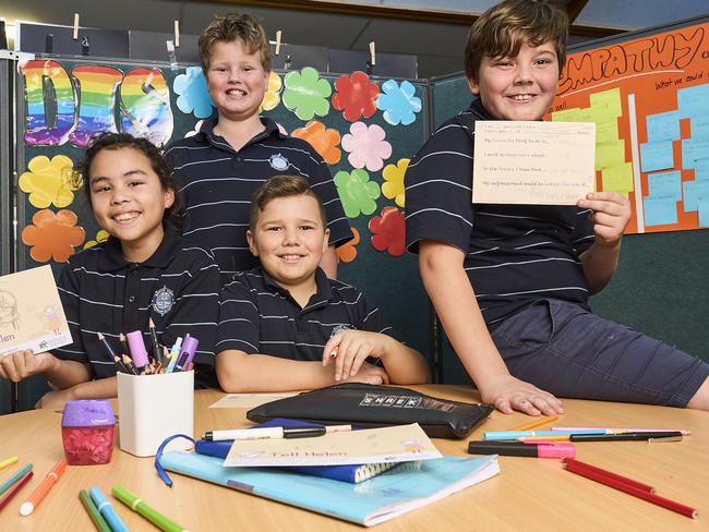 Ysabella Wright, 10, Jake Kilgallon, 11, Orlando Wade, 10, and Eli Iversen, 10 at South Port Primary School in Port Noarlunga South, with postcards to the Commissioner, Friday, July 26, 2024. Picture: Matt Loxton