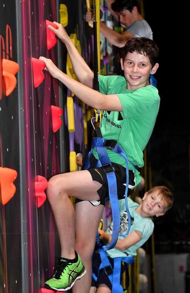 Rocco Pini, 12, enjoys himself on the Gorilla Warrior course at The Jungle Adventure Play at Tingalpa. Picture: John Gass