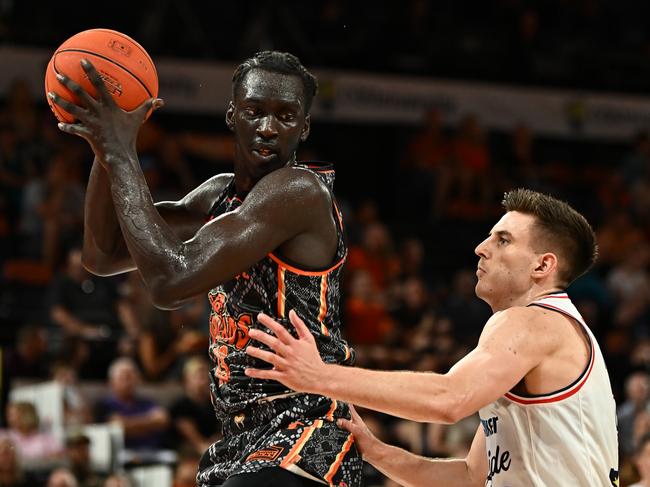 Akoldah Gak of the Taipans catches the rebound during the round 15 NBL match between Cairns Taipans and Adelaide 36ers at Cairns Convention Centre. (Photo by Emily Barker/Getty Images)