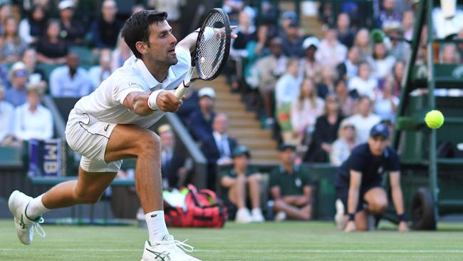 Novak Djokovic stretches for a return against Denis Kudla. Picture: AFP