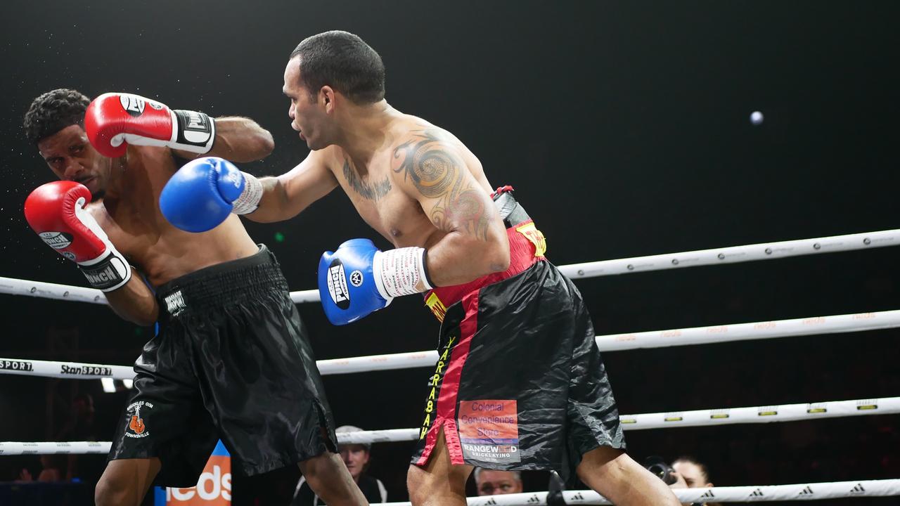 Patrick Clarke (red gloves) fights Alan Patterson (blue gloves) at the Battle of the Reef fight night at the Townsville Entertainment and Convention centre, October 7 2023. Picture: Blair Jackson.