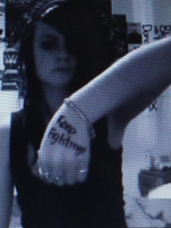 A screenshot of Courtney with the words ‘keep fighting’ written on her hand.